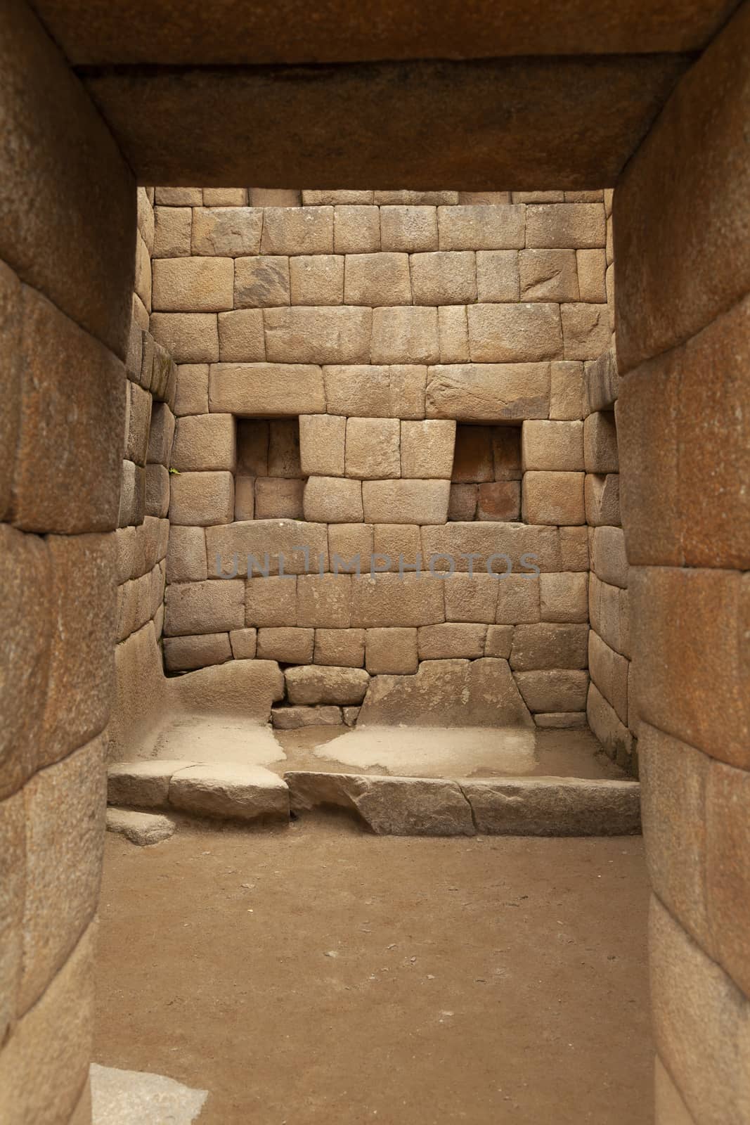 Machu Picchu, Peru - April 6, 2014: Architecture and details of the ancestral constructions and buildings of the Inca civilization, in Machu Picchu, Peru.