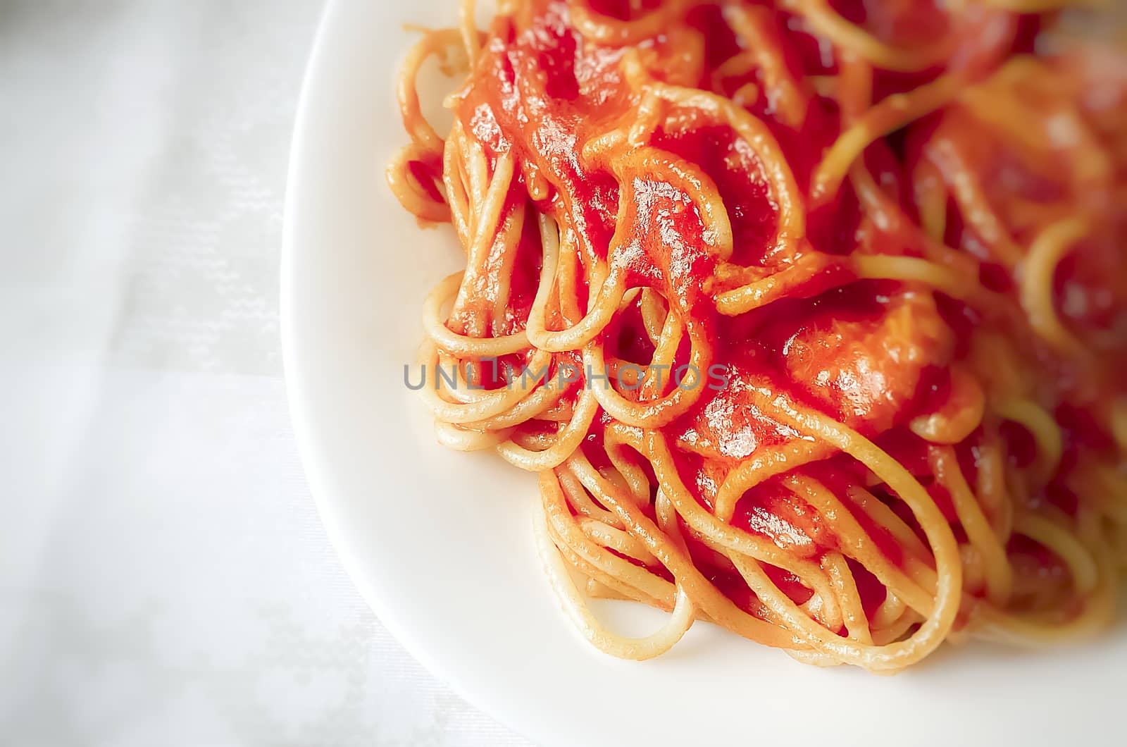 Close up of a plate of spaghetti with tomato sauce by rarrarorro