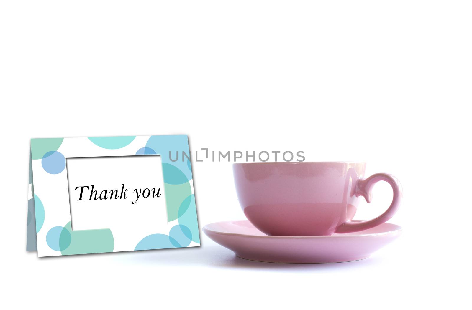 Pink porcelain cup of tea with thank you card on white background. Card, poster, mock up. Celebrating, anniversary, birthday concept.