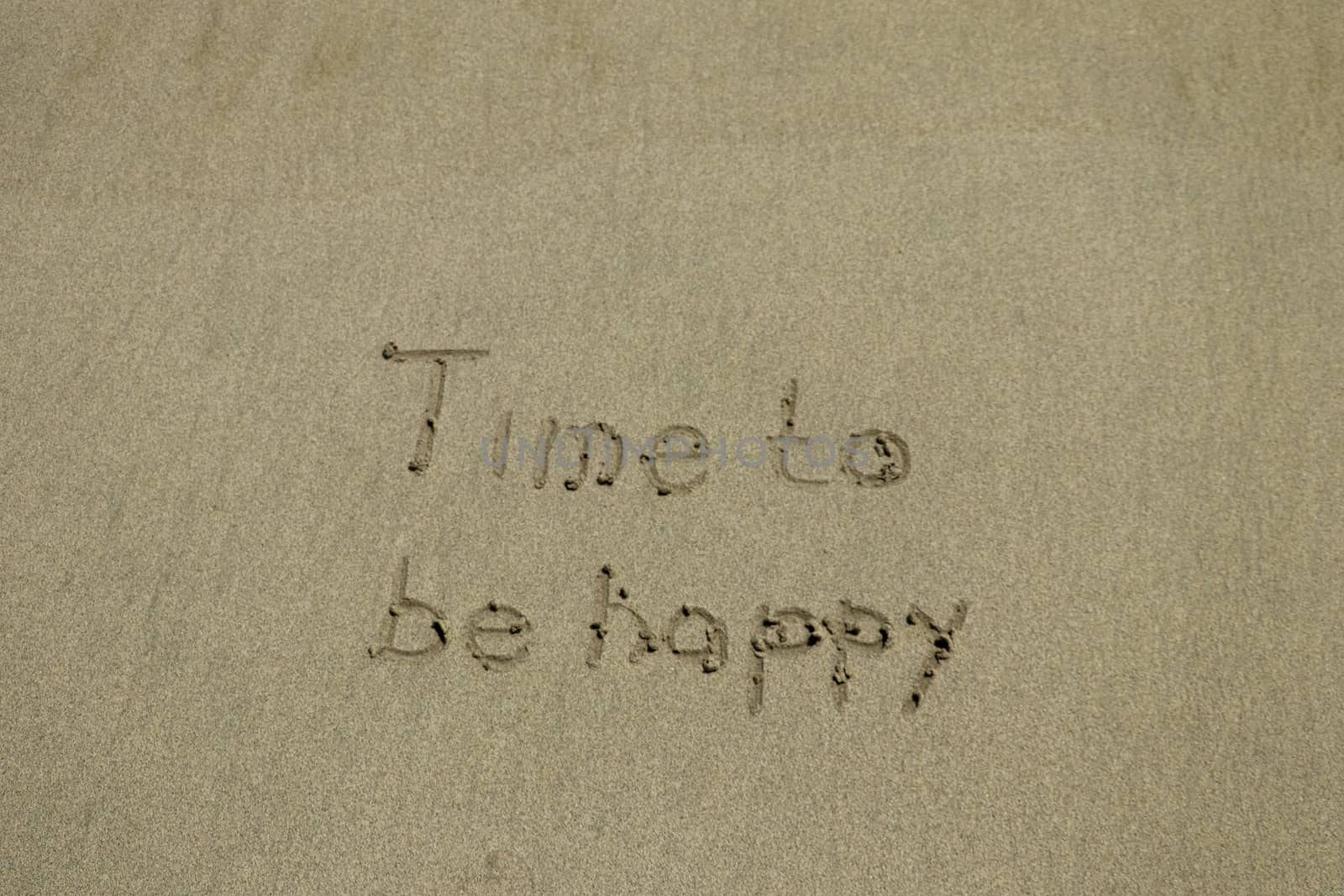 Close-up Of Time To Be Happy Text And Smile Written On Sand At Beach by Sanatana2008