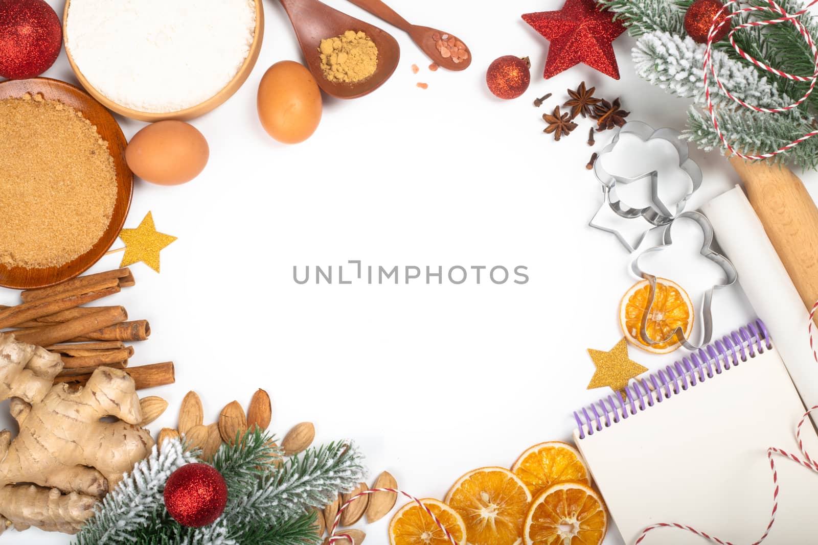 Christmas gingerbread cookies cooking background flat lay top view template with copy space for text. Baking utensils, spices and food ingredients border frame isolated on white background