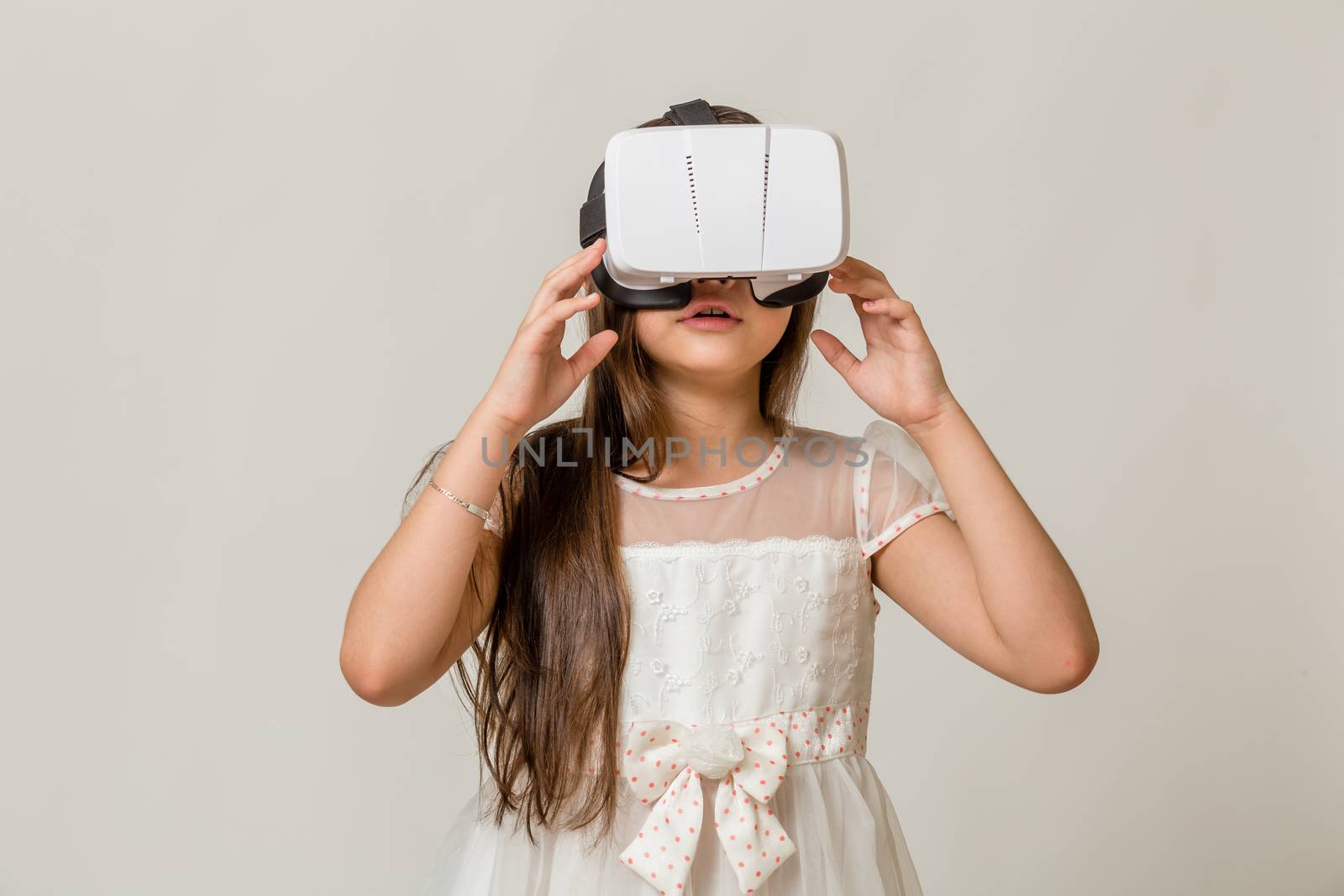 Young girl in VR goggles by imagesbykenny