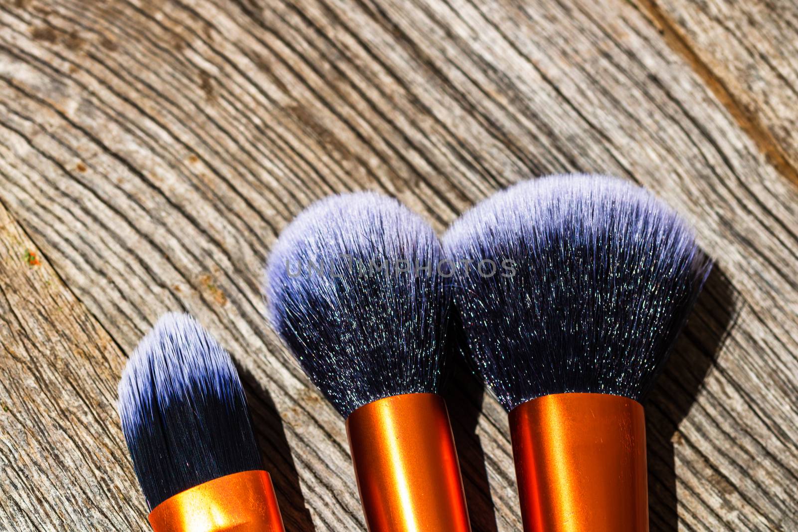 Make-up concept. Make-up brushes.  Concelear brush, foundation brush, blush brush and powder brush.