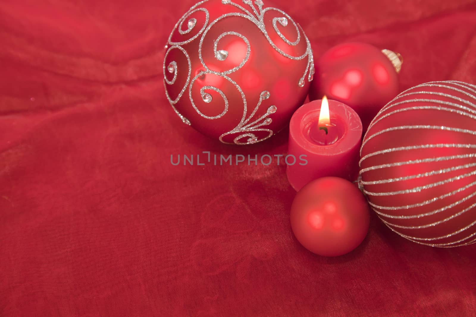Red Christmas decoration with candle light and copy space
