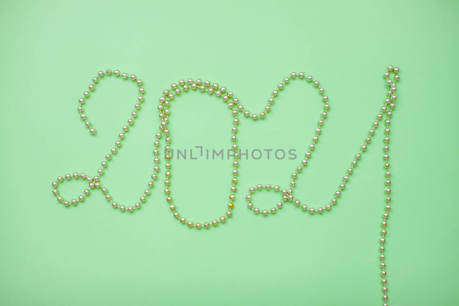 Happy New year 2021 celebration. Inscription 2021 from gold shiny new year beads by malyshkamju