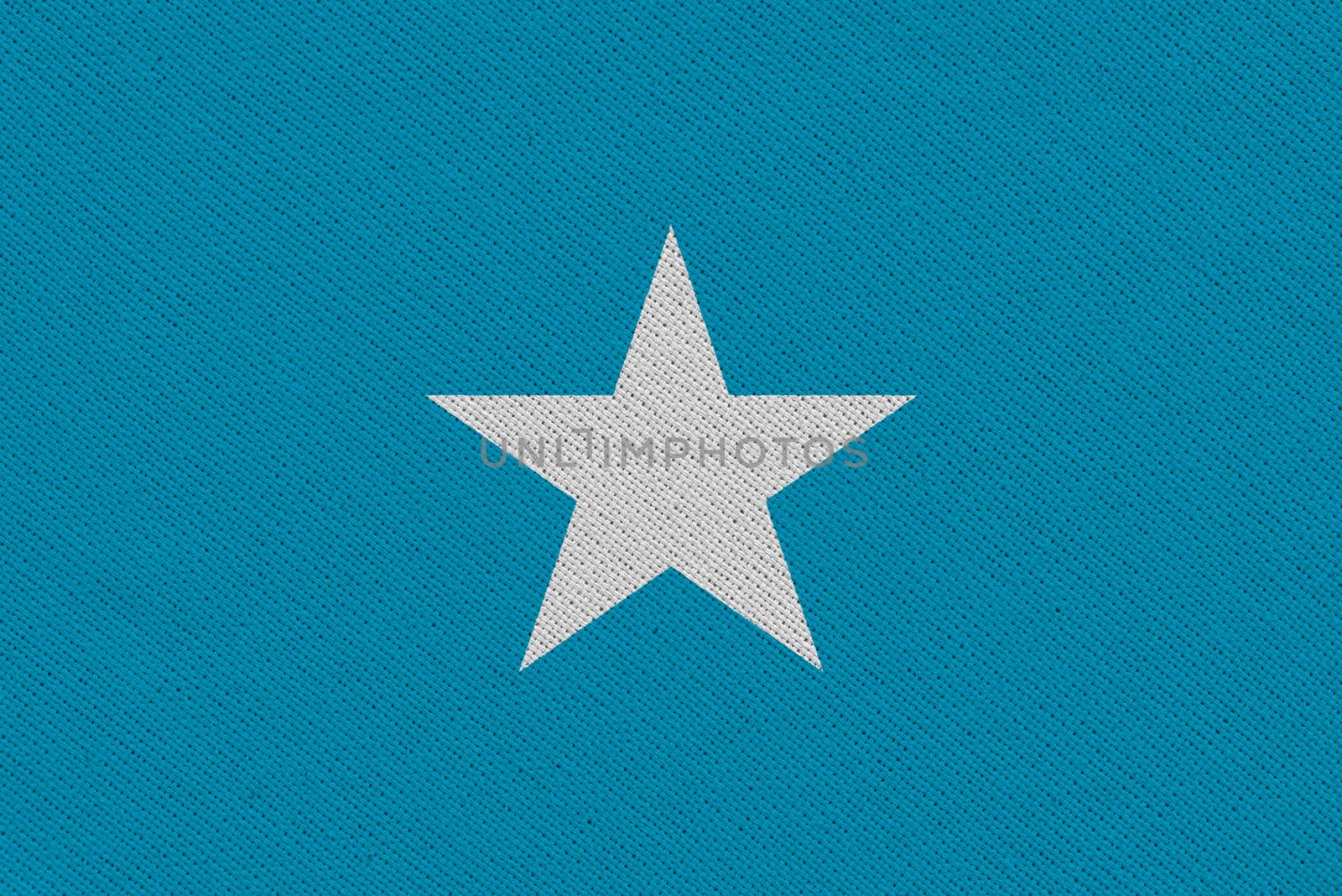 Somalia fabric flag. Patriotic background. National flag of Somalia