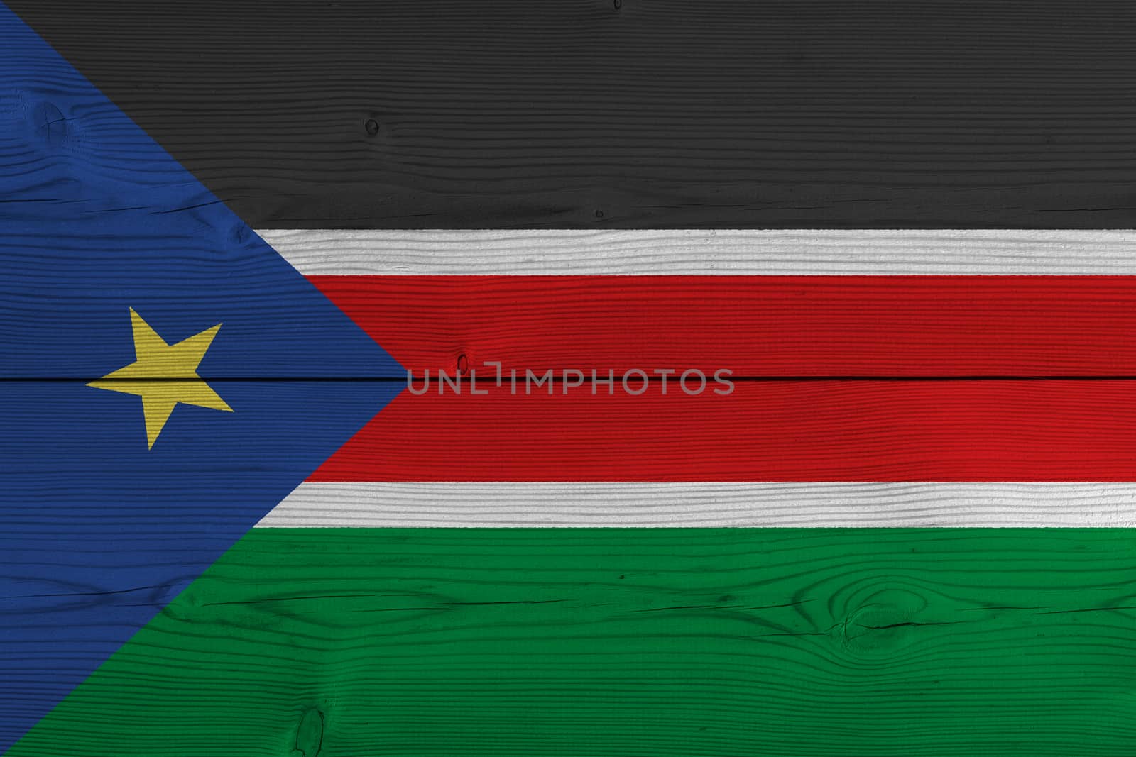 South Sudan flag painted on old wood plank by Visual-Content
