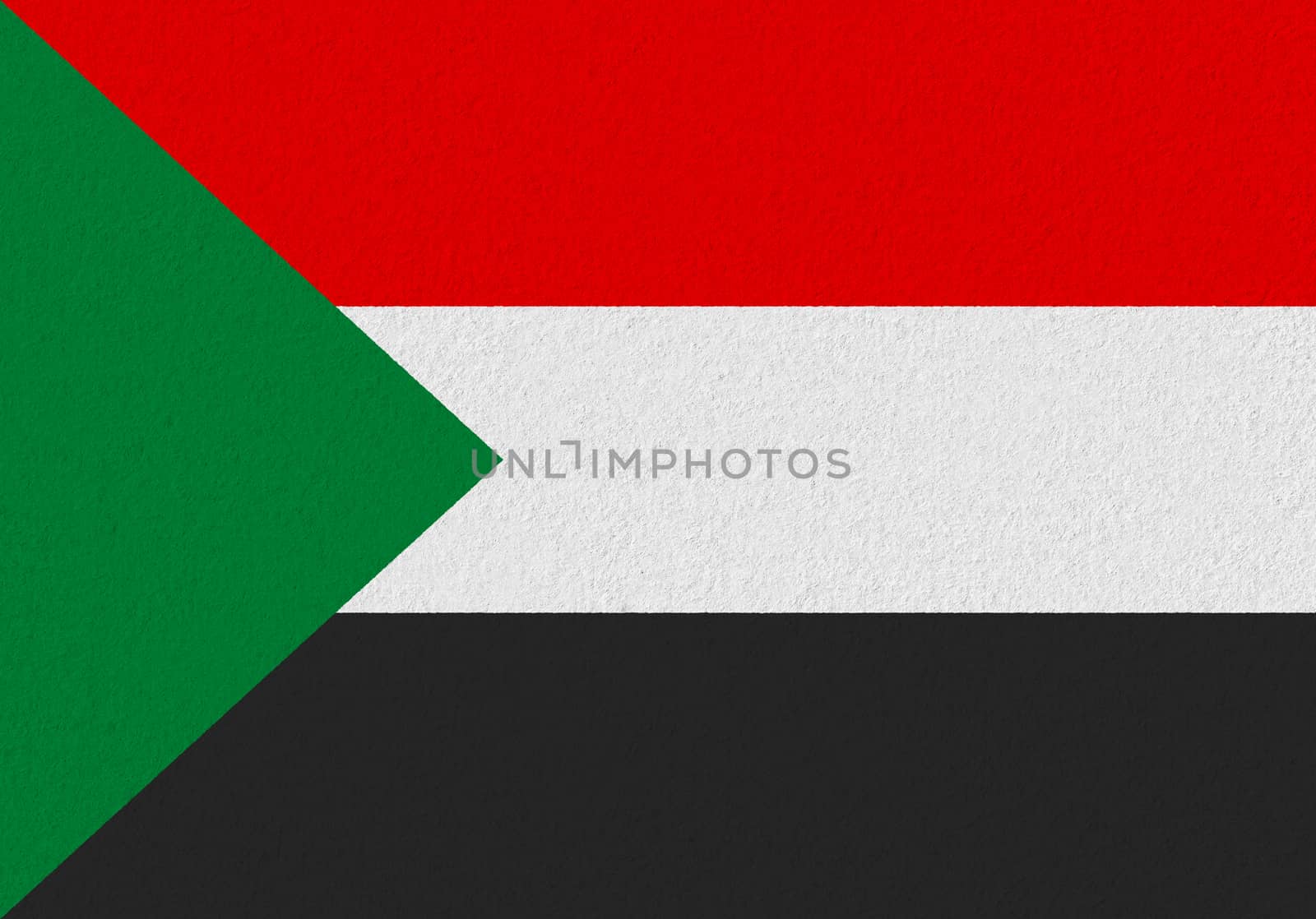 Sudan paper flag. Patriotic background. National flag of Sudan