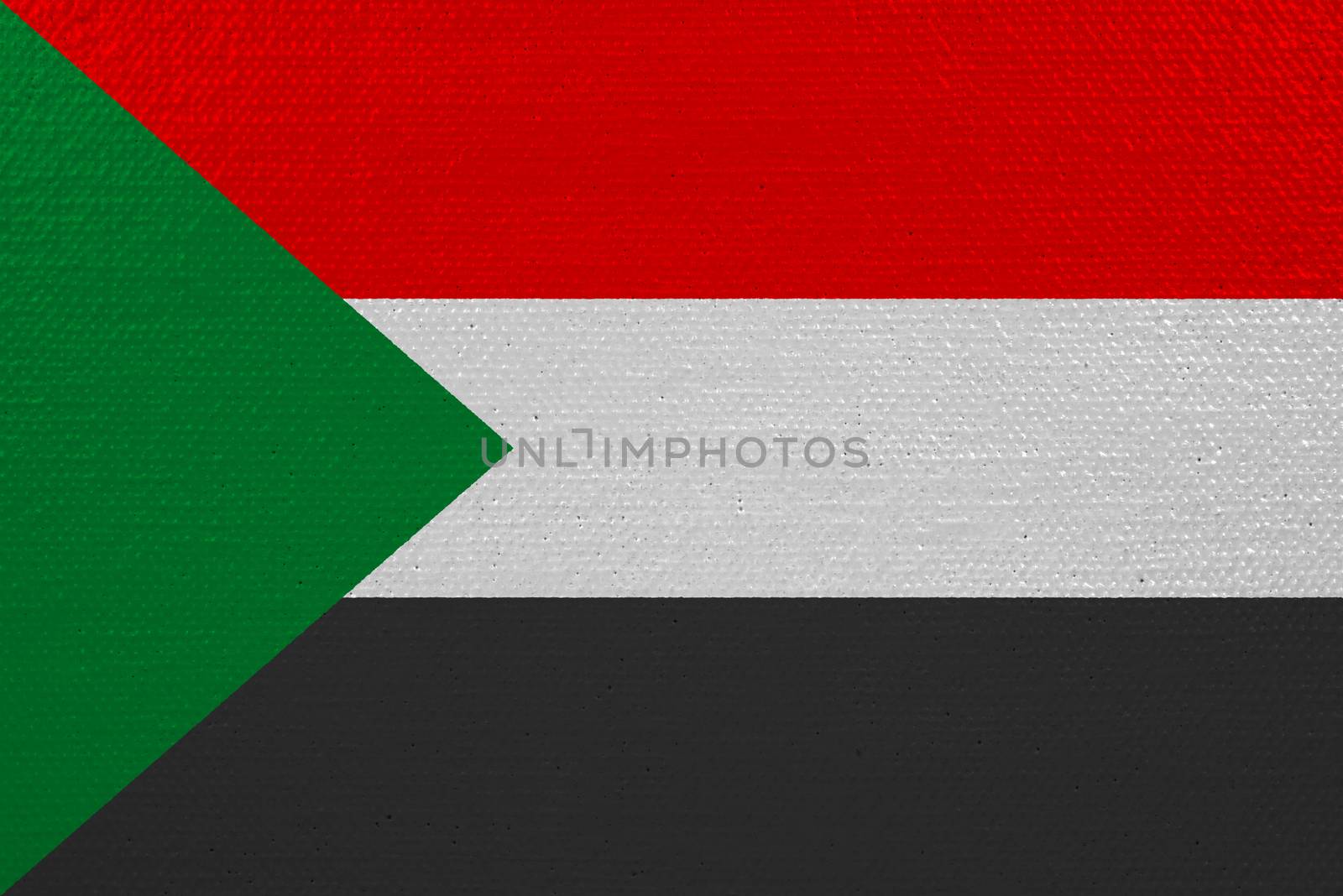 Sudan flag on canvas. Patriotic background. National flag of Sudan