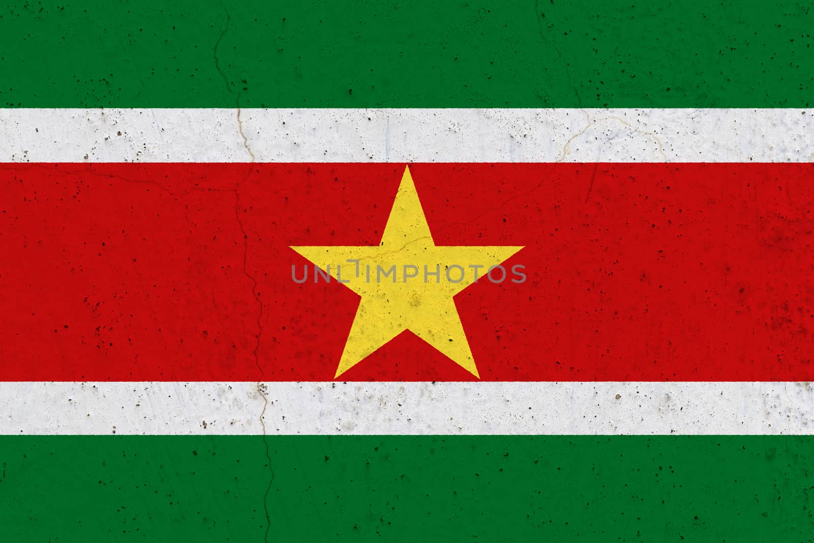 Suriname flag on concrete wall. Patriotic grunge background. National flag of Suriname