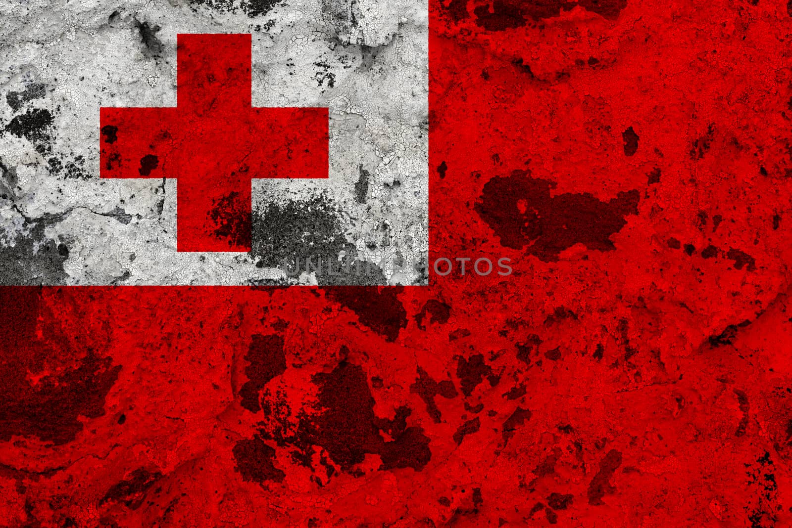 Tonga flag on old wall. Patriotic grunge background. National flag of Tonga