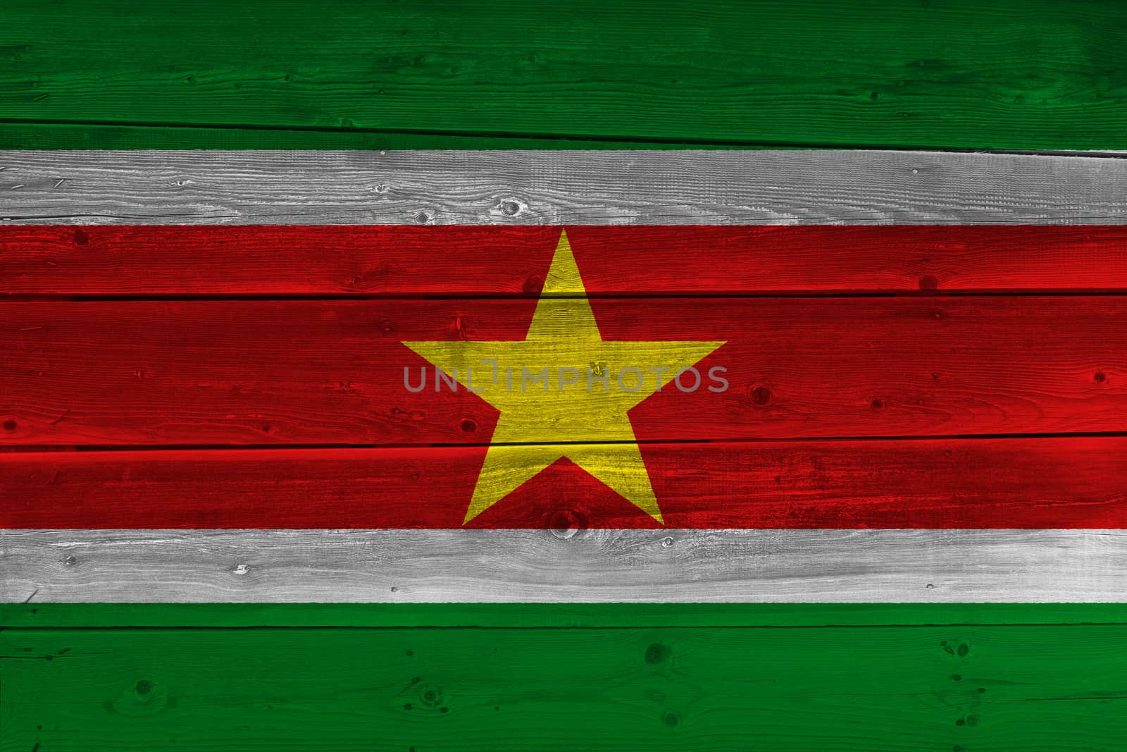 Suriname flag painted on old wood plank by Visual-Content