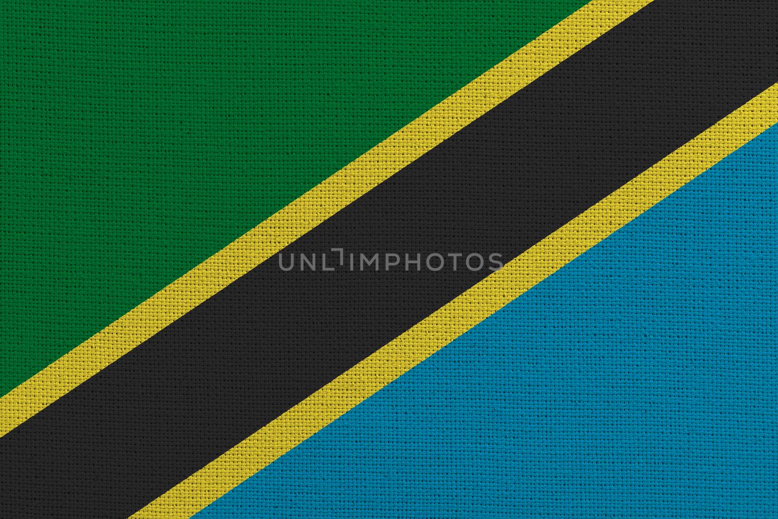 Tanzania fabric flag. Patriotic background. National flag of Tanzania