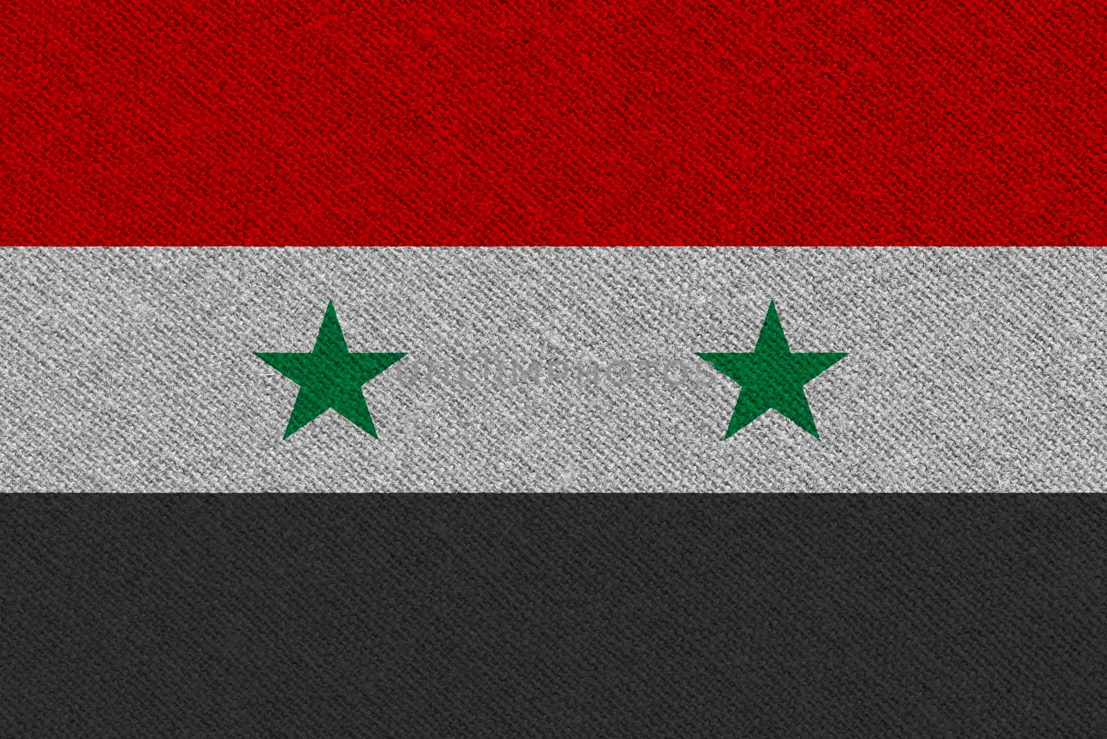 Syria fabric flag. Patriotic background. National flag of Syria