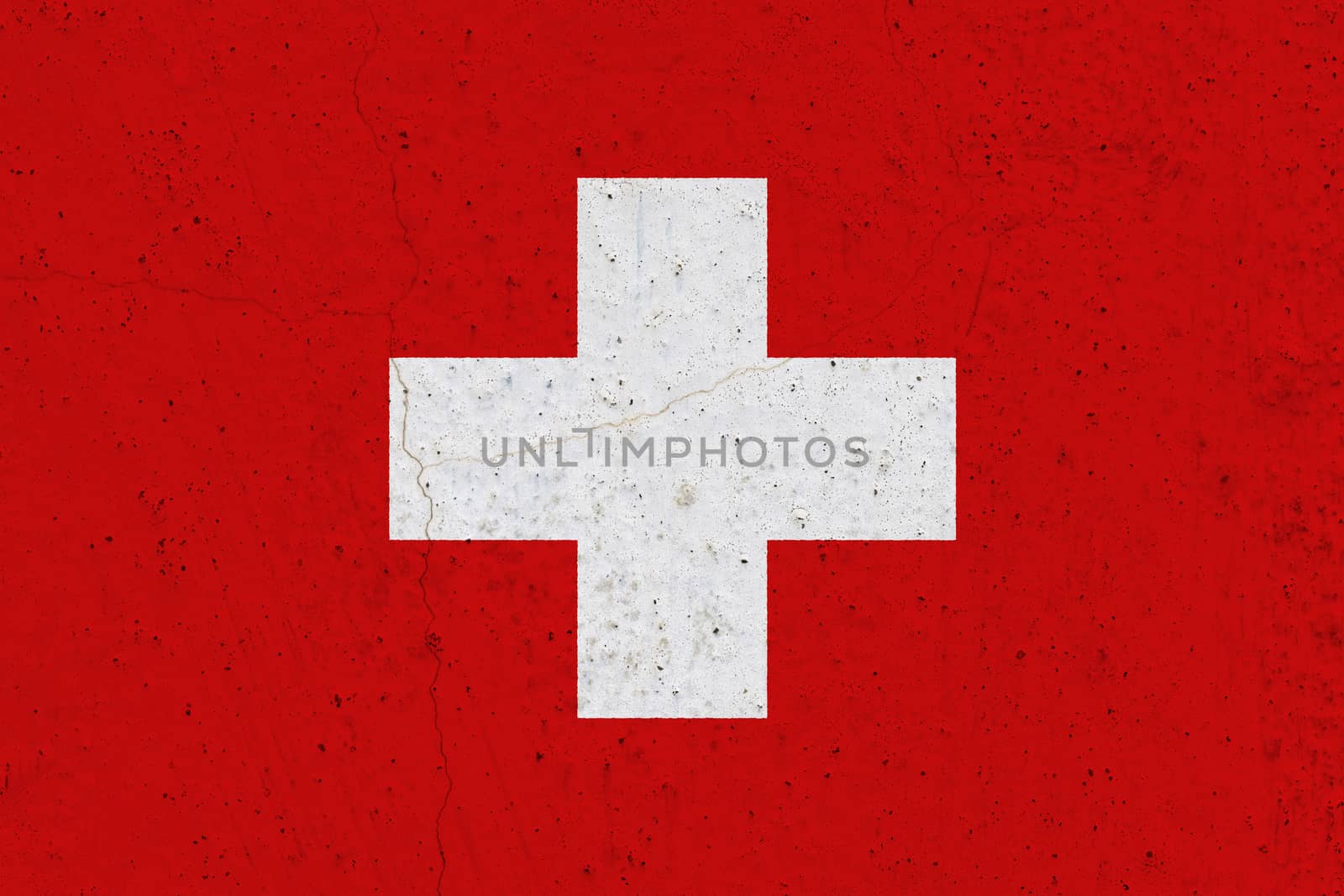 Switzerland flag on concrete wall. Patriotic grunge background. National flag of Switzerland