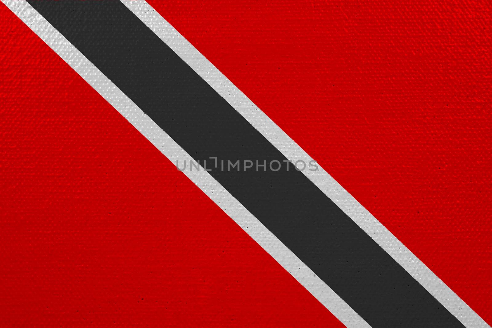 Trinidad and Tobago flag on canvas. Patriotic background. National flag of Trinidad and Tobago