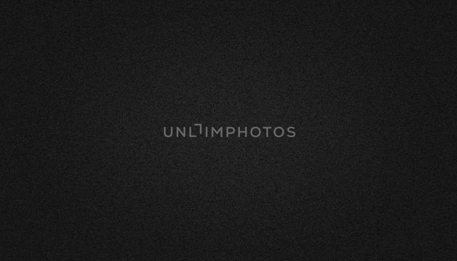Black paper texture background with soft glowing backdrop, background texture for design