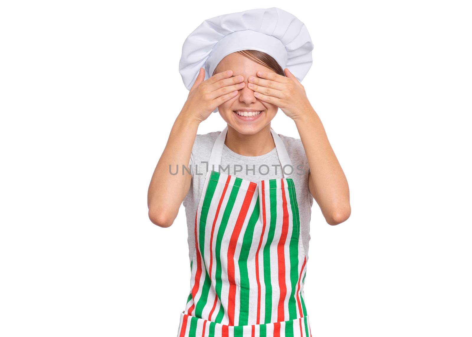 Cute girl in chef uniform isolated on white background covering eyes with hands