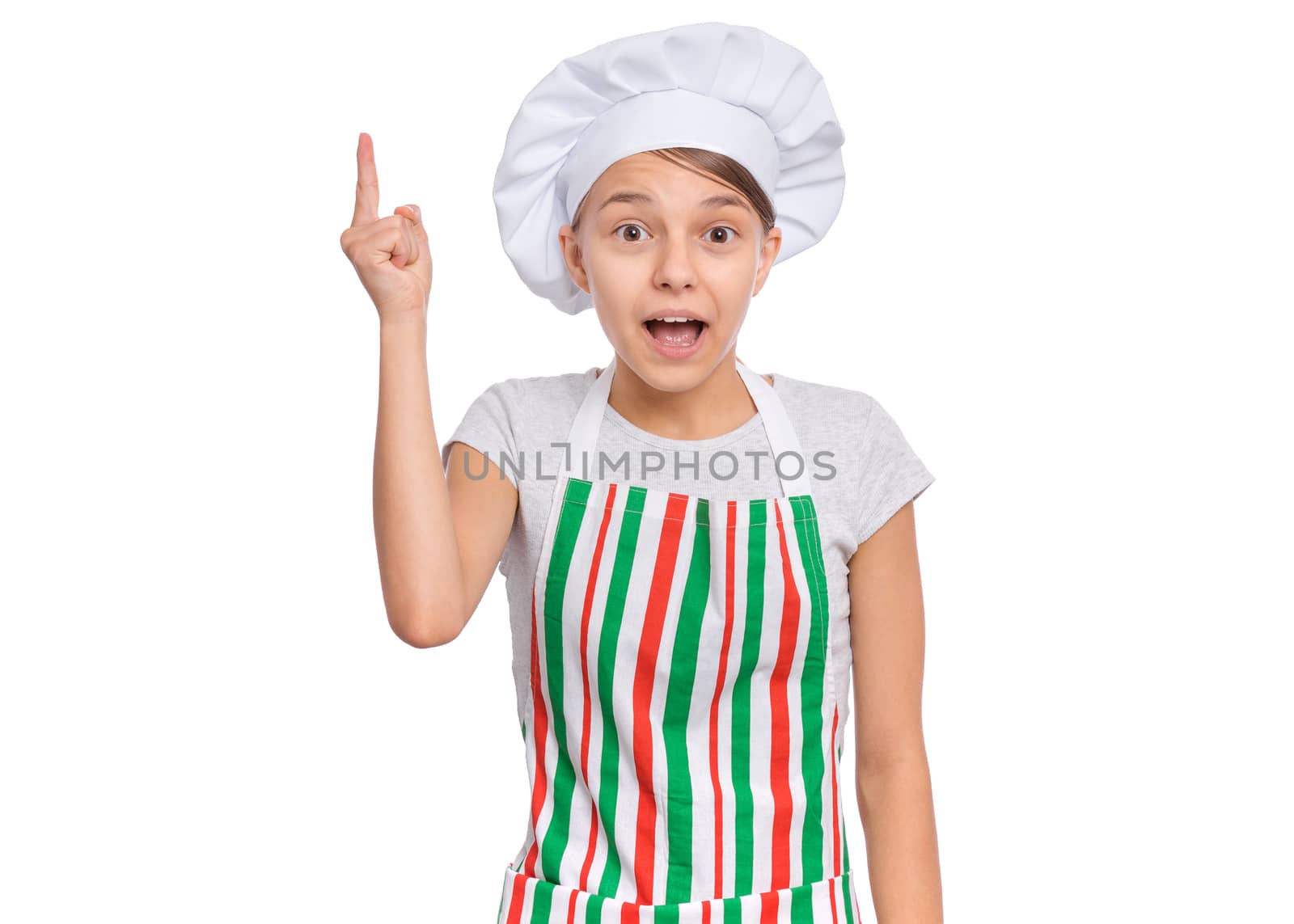 Happy teenage girl wearing chef hat in apron with emotions showing signs with hands, isolated on a white background.