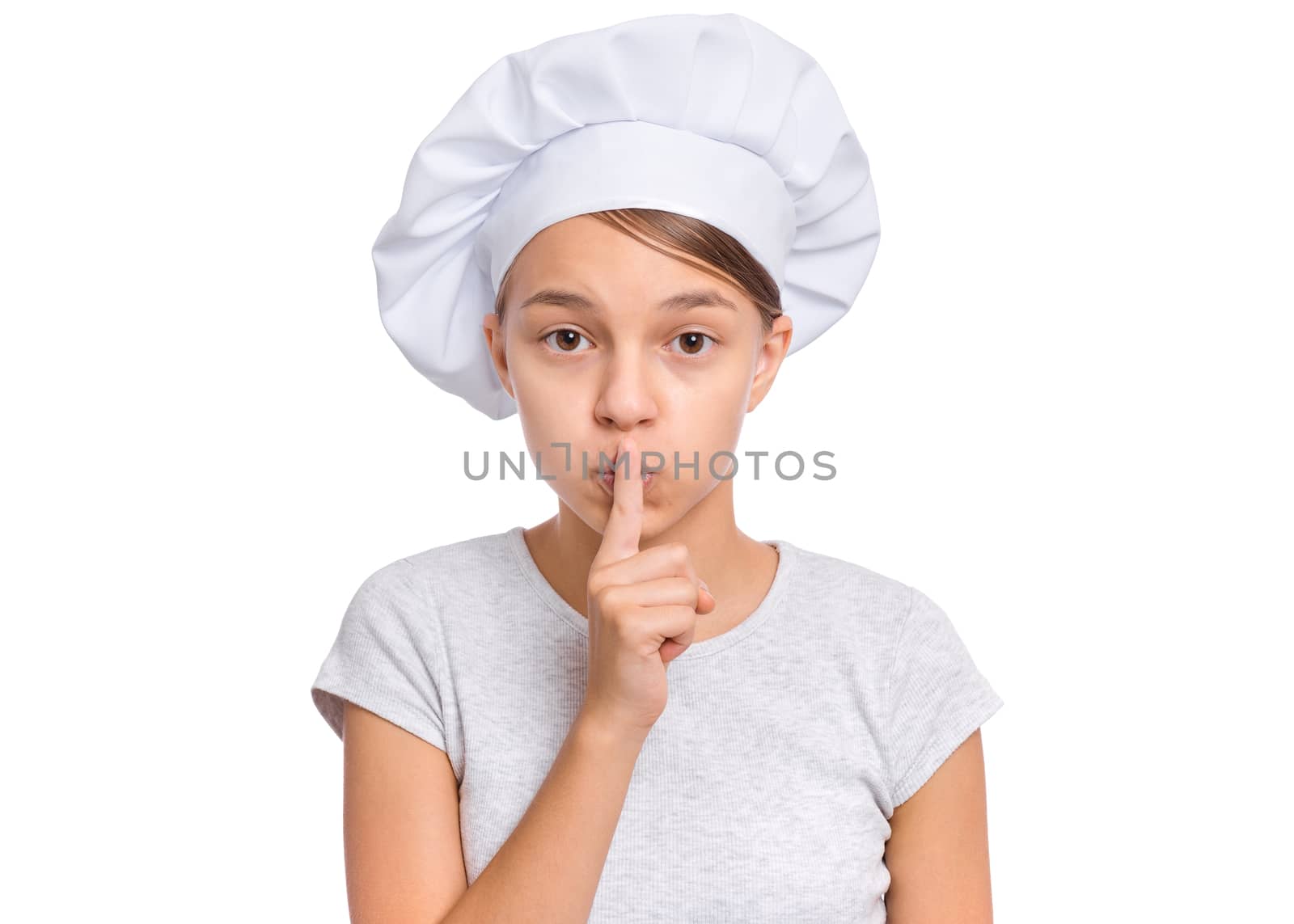 Teen girl in chef hat with emotions showing signs with hands, isolated on a white background.