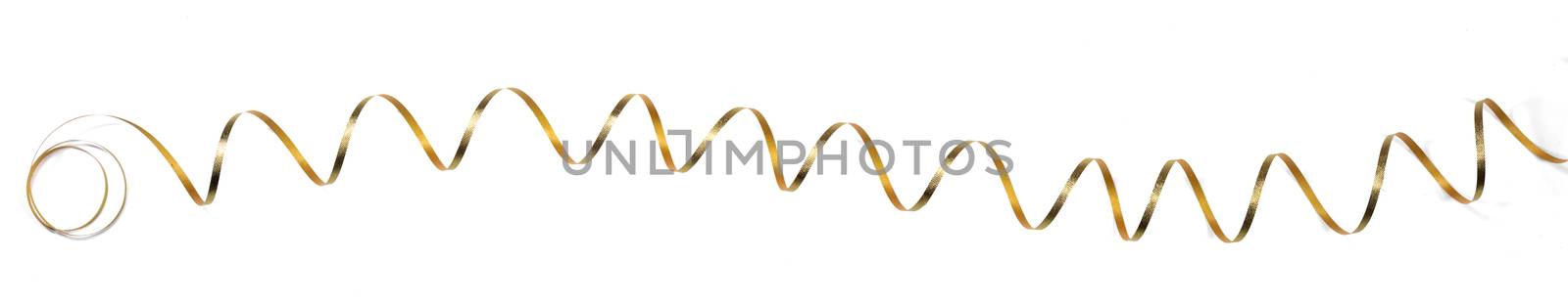 Golden curly ribbon decoration isolated on white background