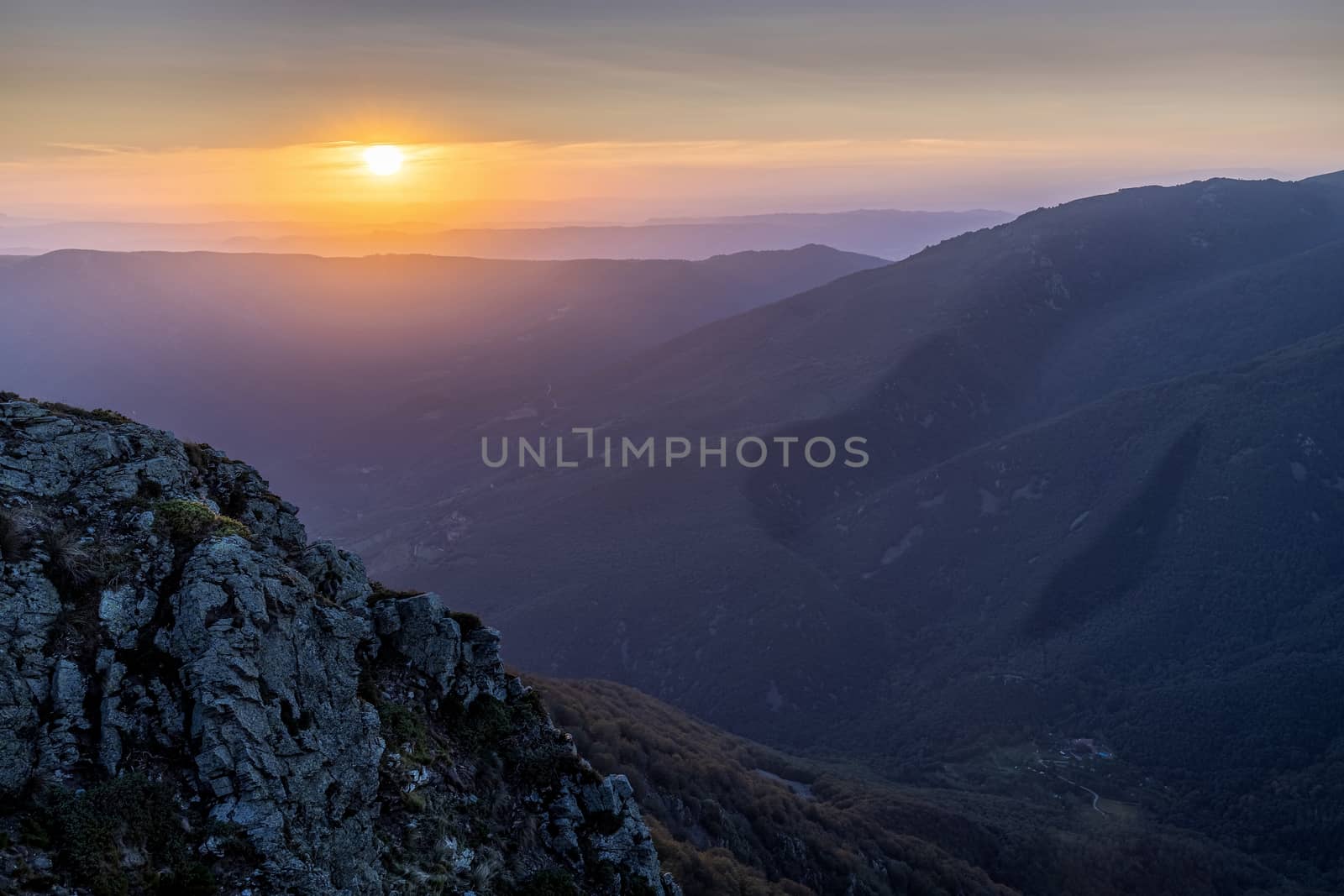Spanish mountain peaks in Catalonia in sunset light by Digoarpi