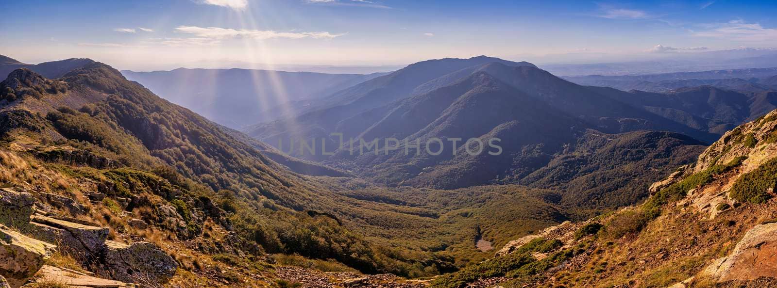 Sunset light over the mountain Montseny in Spain by Digoarpi