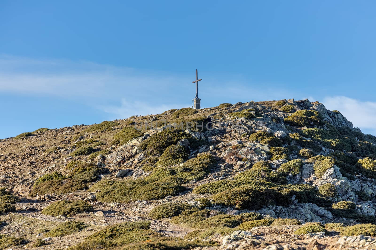 Cross on the pike of mountain in Spain, mountain Montseny by Digoarpi