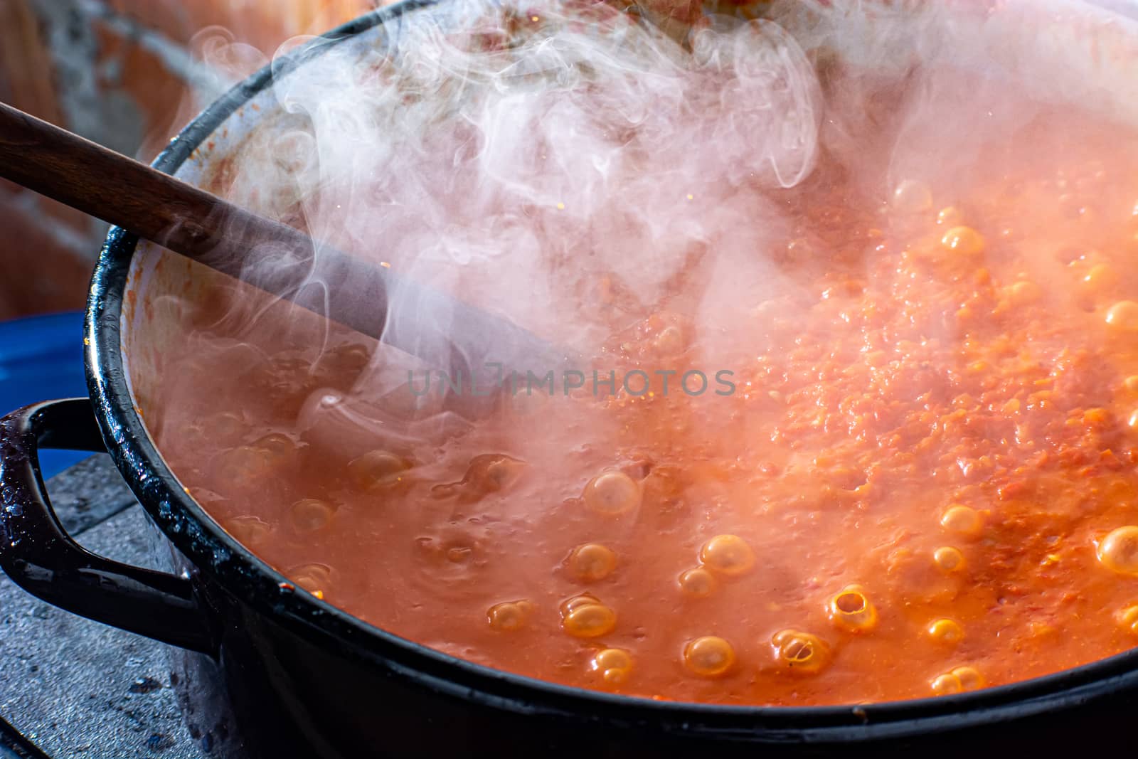 Cooking Ajvar made of tomatoes and paprika buy the old recepies