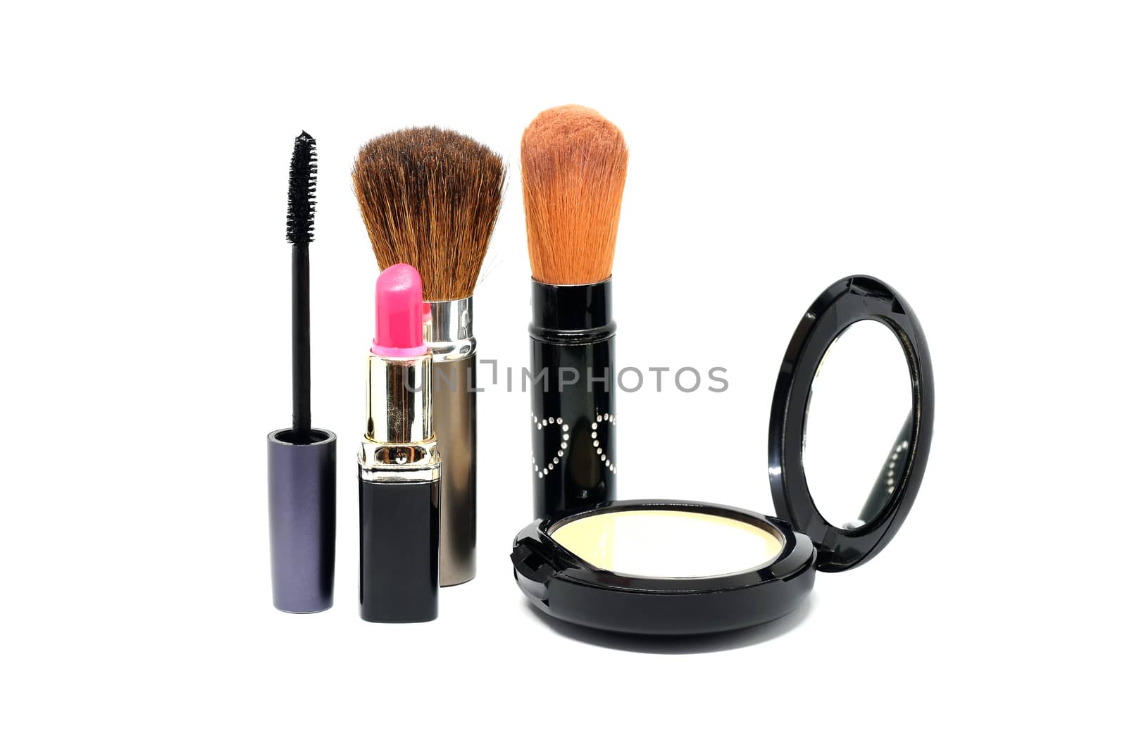 Closeup group of makeup cosmetics on white background.