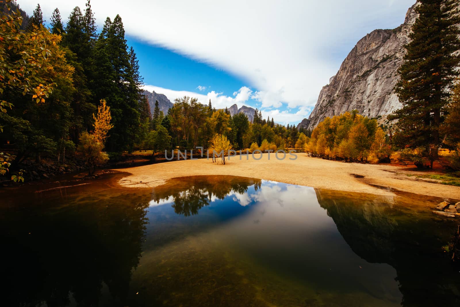 The view from within Yosemite Valley of surrounding rock faces on a stormy day in California, USA