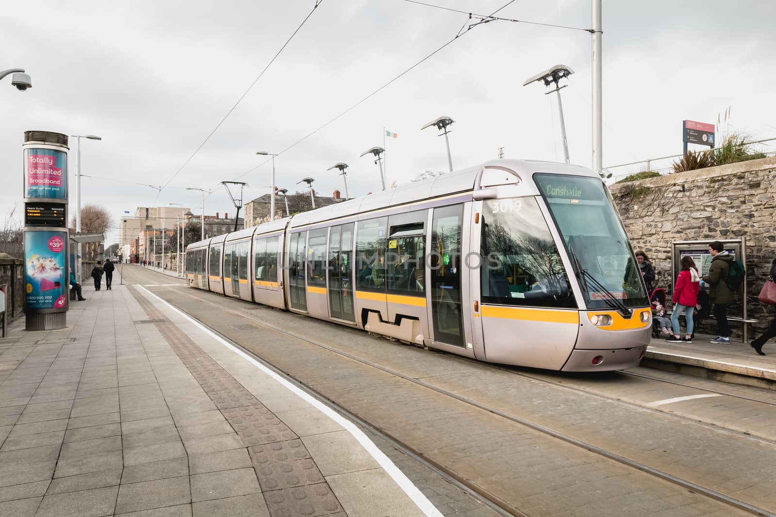 Passengers in a tram station  in Dublin, Ireland by AtlanticEUROSTOXX