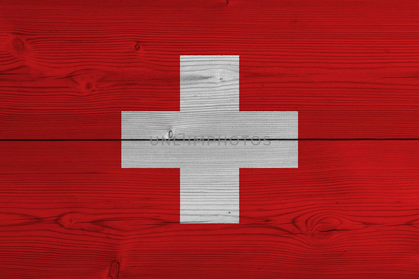 Switzerland flag painted on old wood plank by Visual-Content
