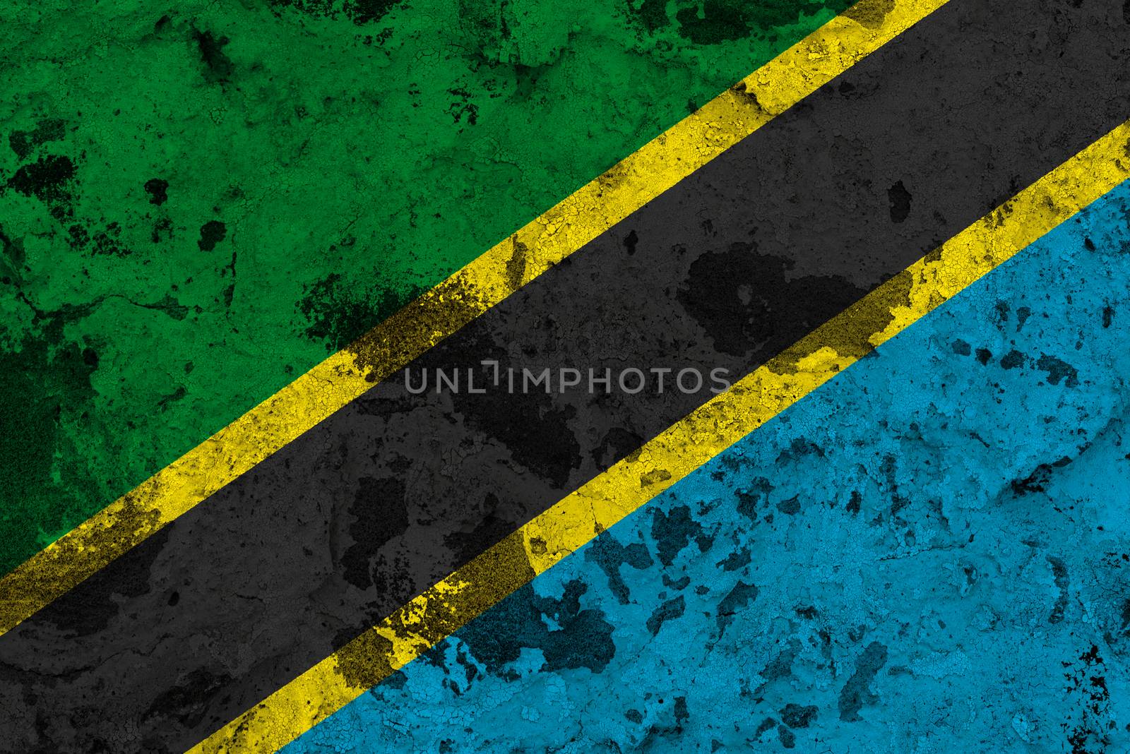 Tanzania flag on old wall. Patriotic grunge background. National flag of Tanzania