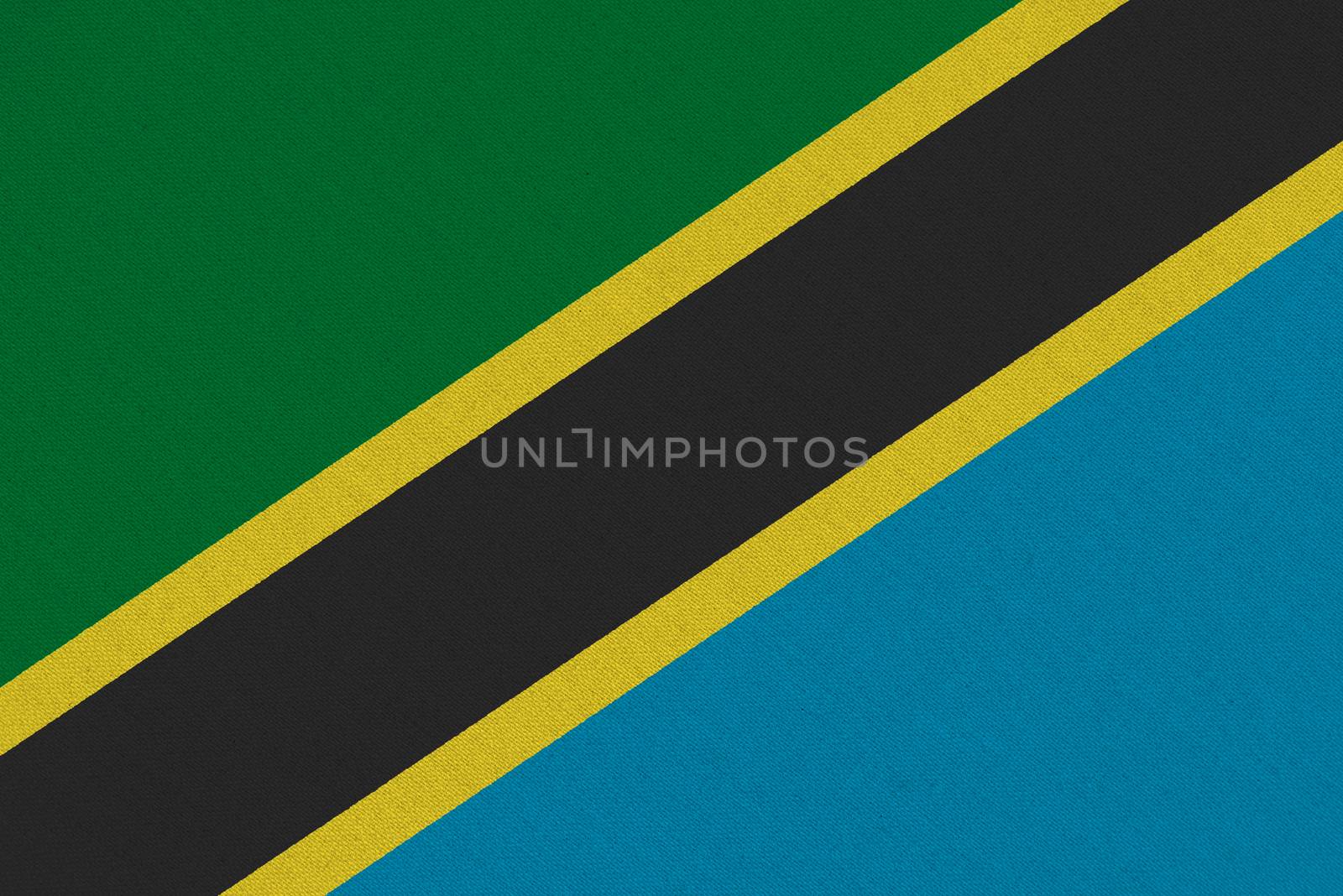 Tanzania fabric flag. Patriotic background. National flag of Tanzania