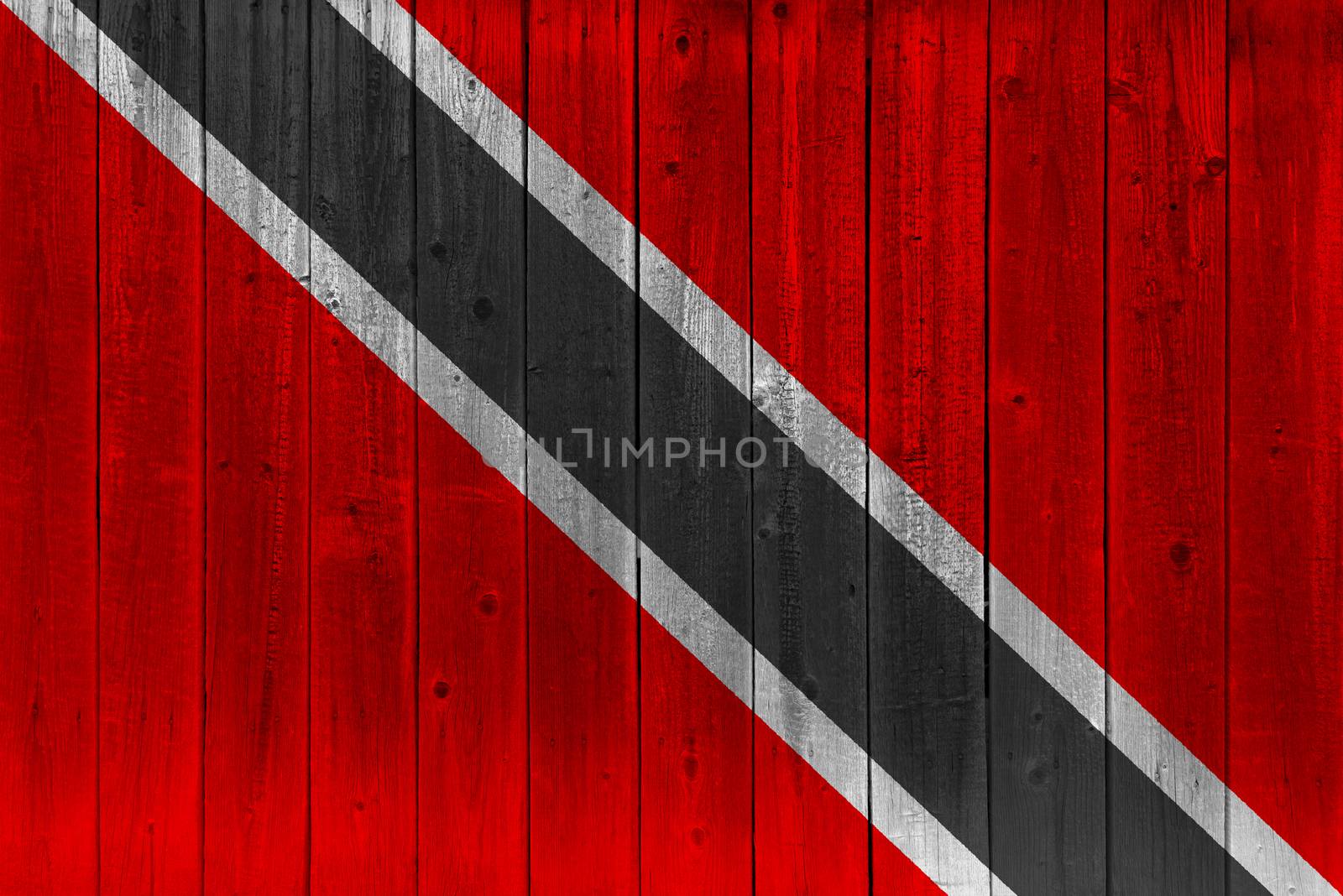 Trinidad and Tobago flag painted on old wood plank. Patriotic background. National flag of Trinidad and Tobago