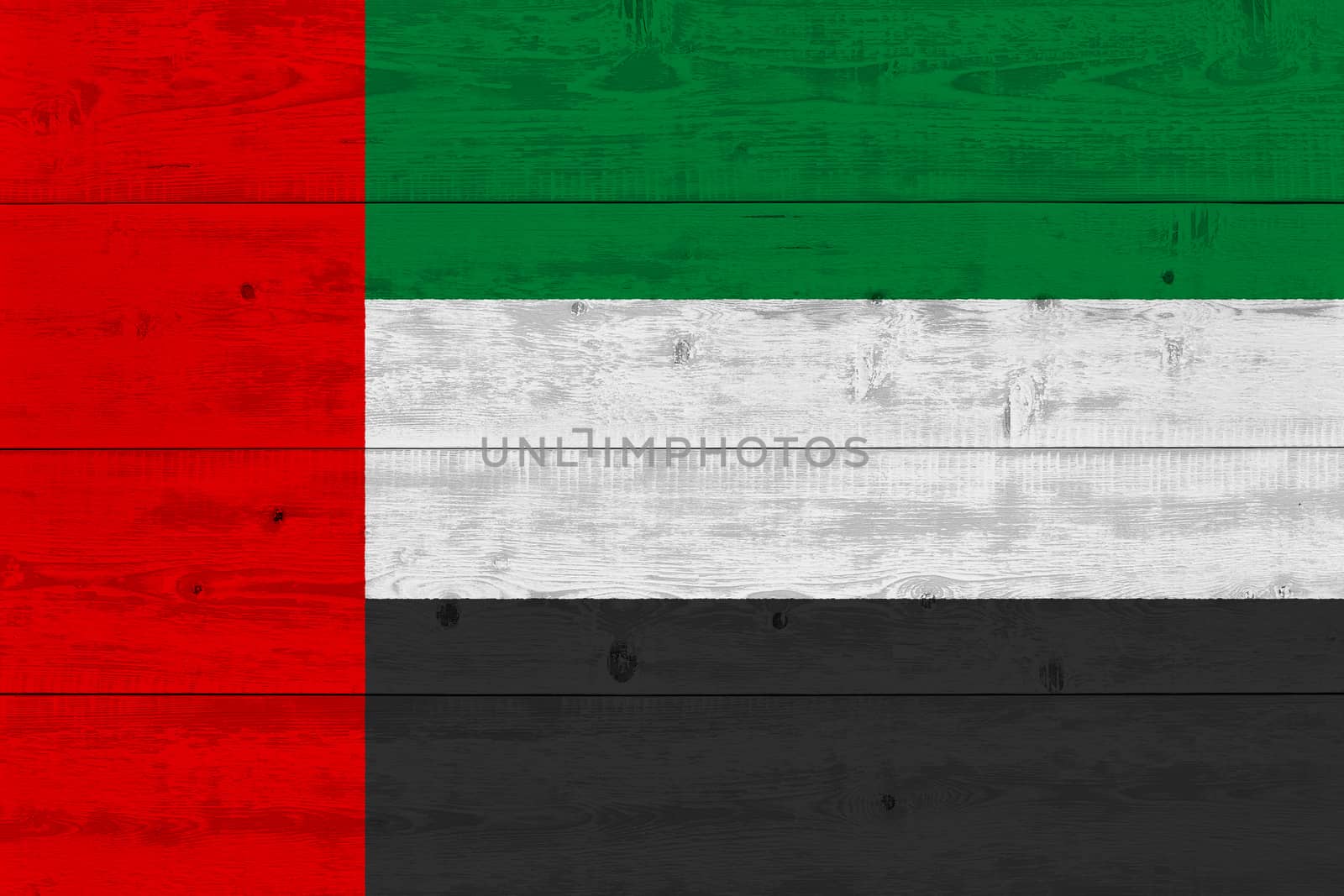 United arab flag painted on old wood plank. Patriotic background. National flag of United arab