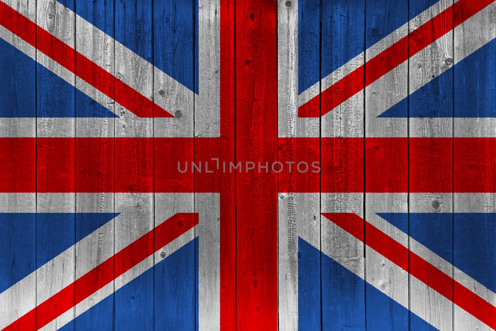 United Kingdom flag painted on old wood plank. Patriotic background. National flag of United Kingdom