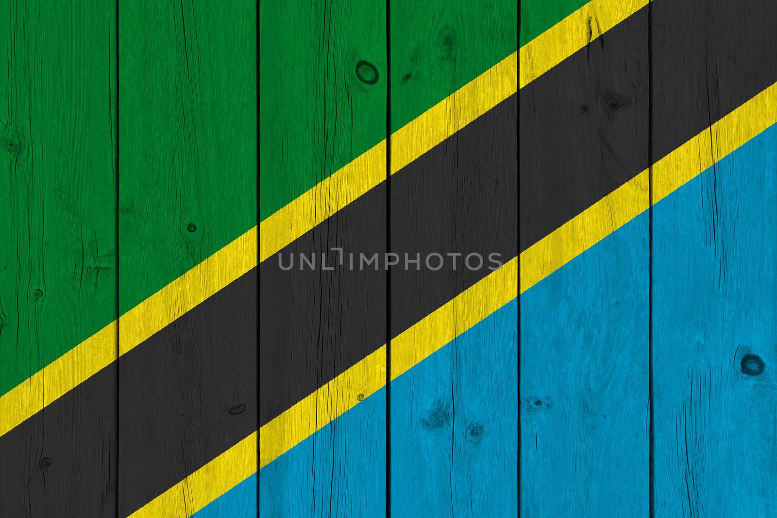 Tanzania flag painted on old wood plank by Visual-Content