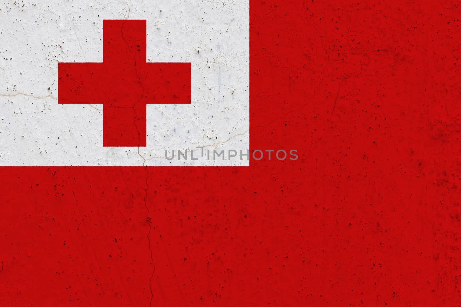 Tonga flag on concrete wall. Patriotic grunge background. National flag of Tonga