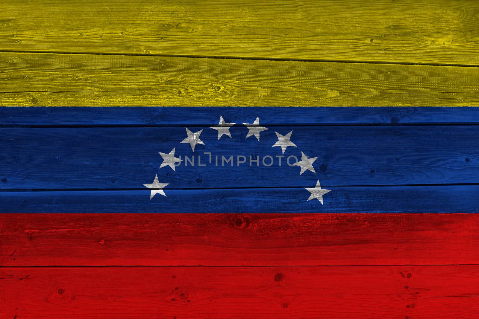 venezuela flag painted on old wood plank by Visual-Content