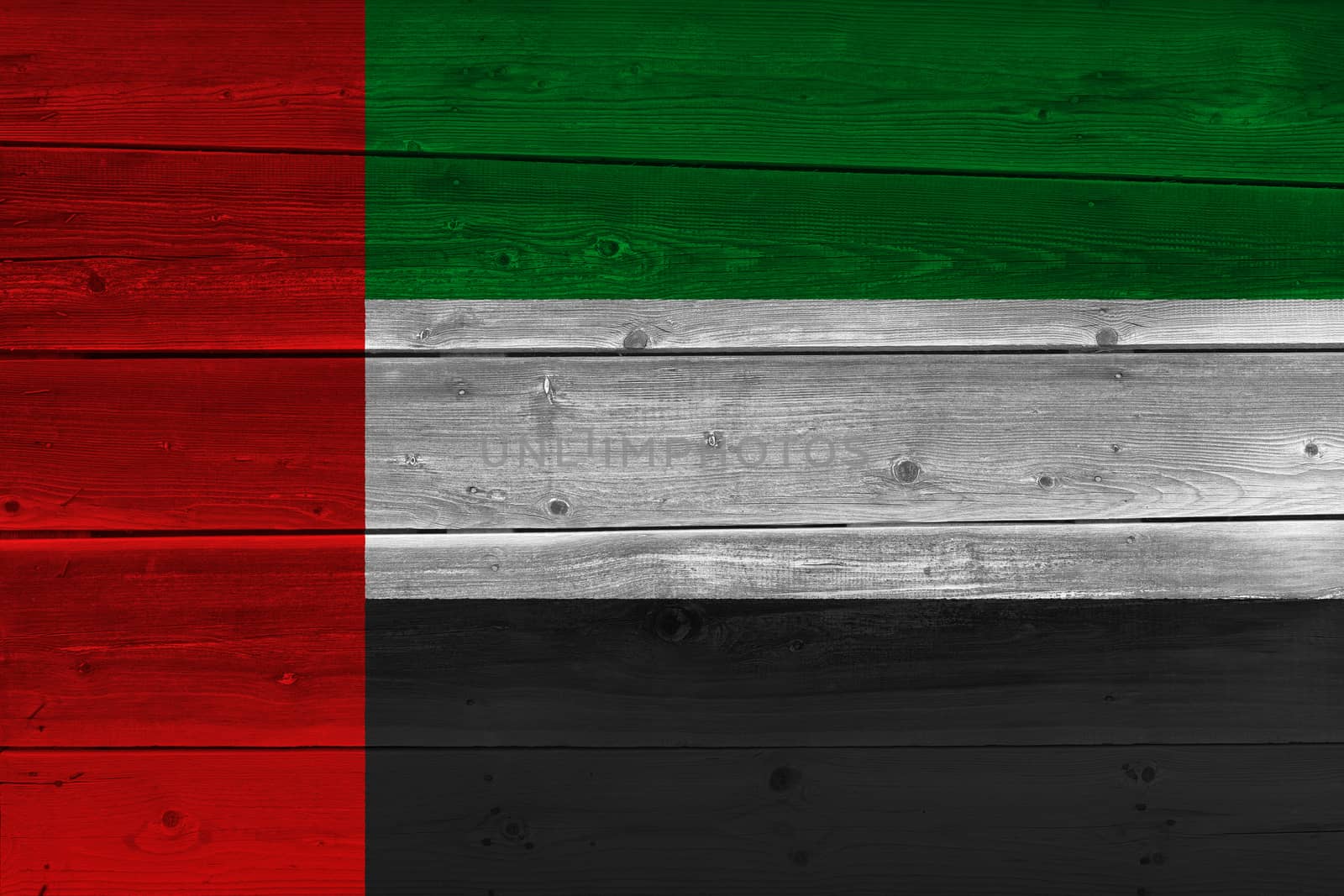 United arab flag painted on old wood plank. Patriotic background. National flag of United arab