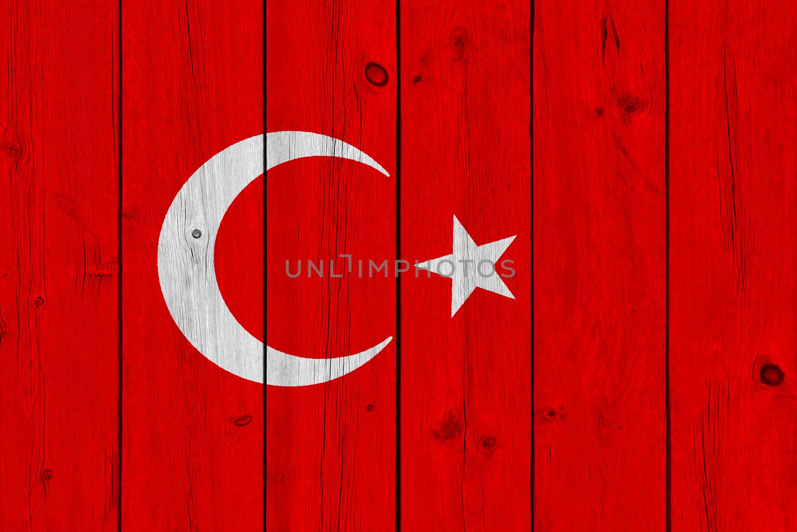 Turkey flag painted on old wood plank. Patriotic background. National flag of Turkey