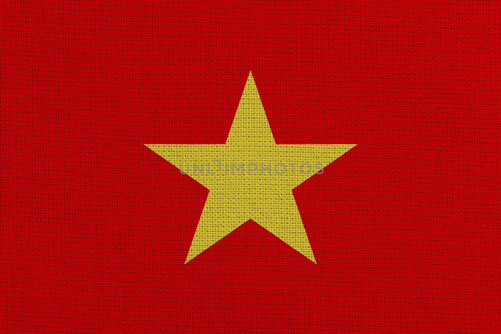 Vietnam fabric flag. Patriotic background. National flag of Vietnam