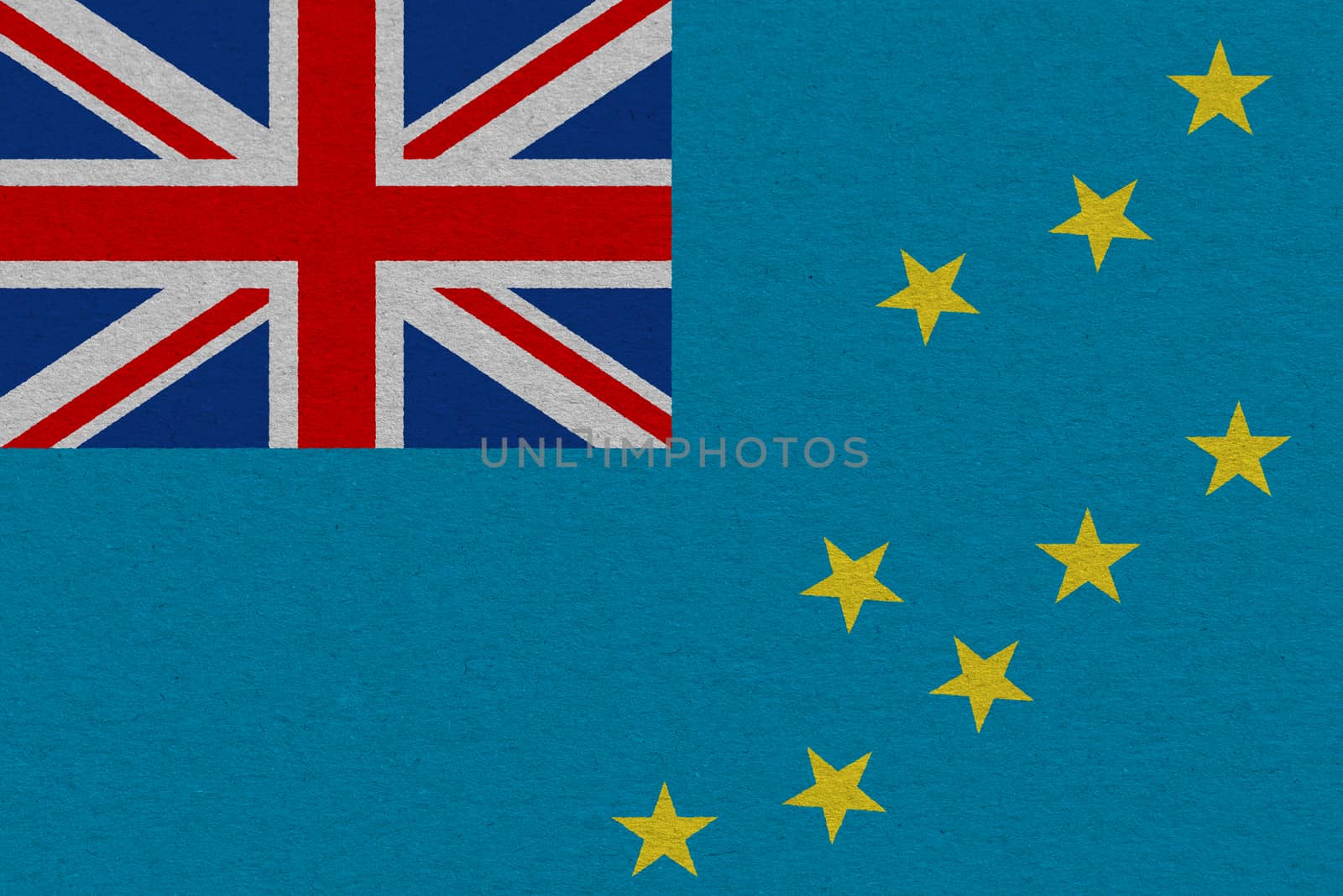 Tuvalu flag painted on paper. Patriotic background. National flag of Tuvalu