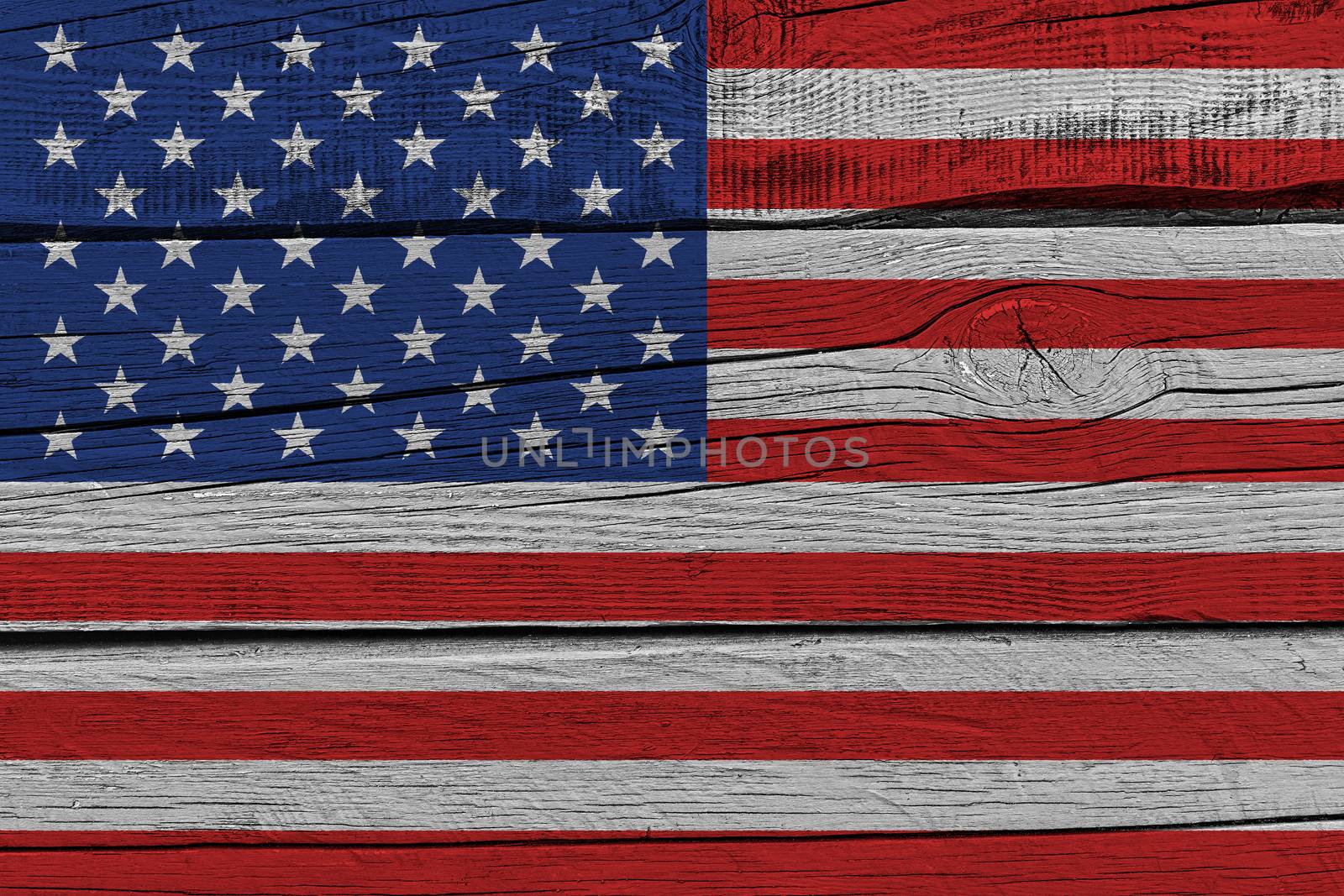 United States of America flag painted on old wood plank. Patriotic background. National flag of United States of America