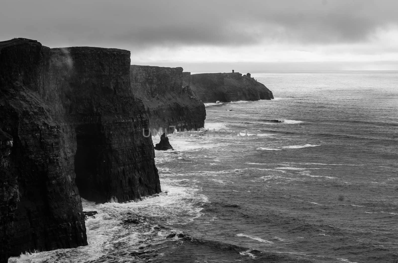  Panoramic view of the Cliff of Moher in a cloudy wintery day, Ireland by mauricallari