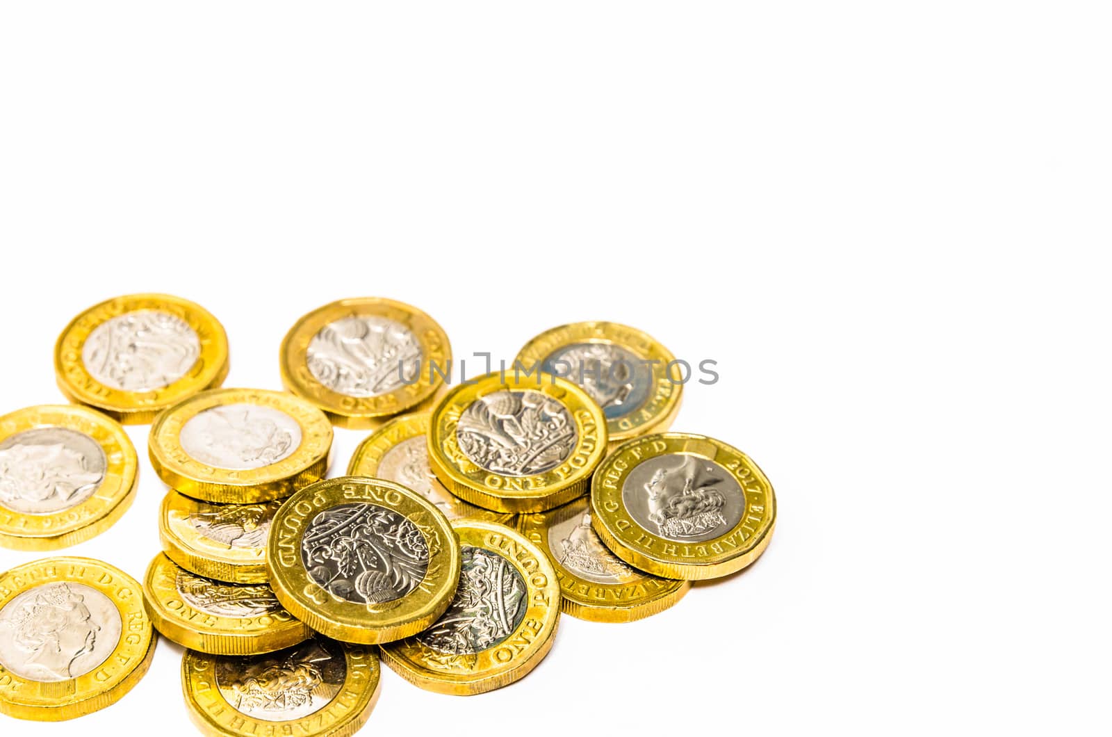 New one pound coins on a white background by mauricallari