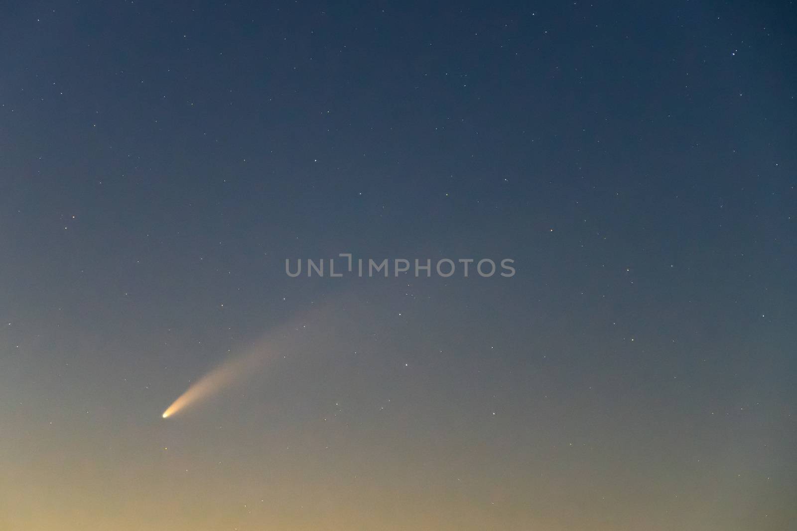 Neowise Comet and its long dust tail after dusk by mauricallari