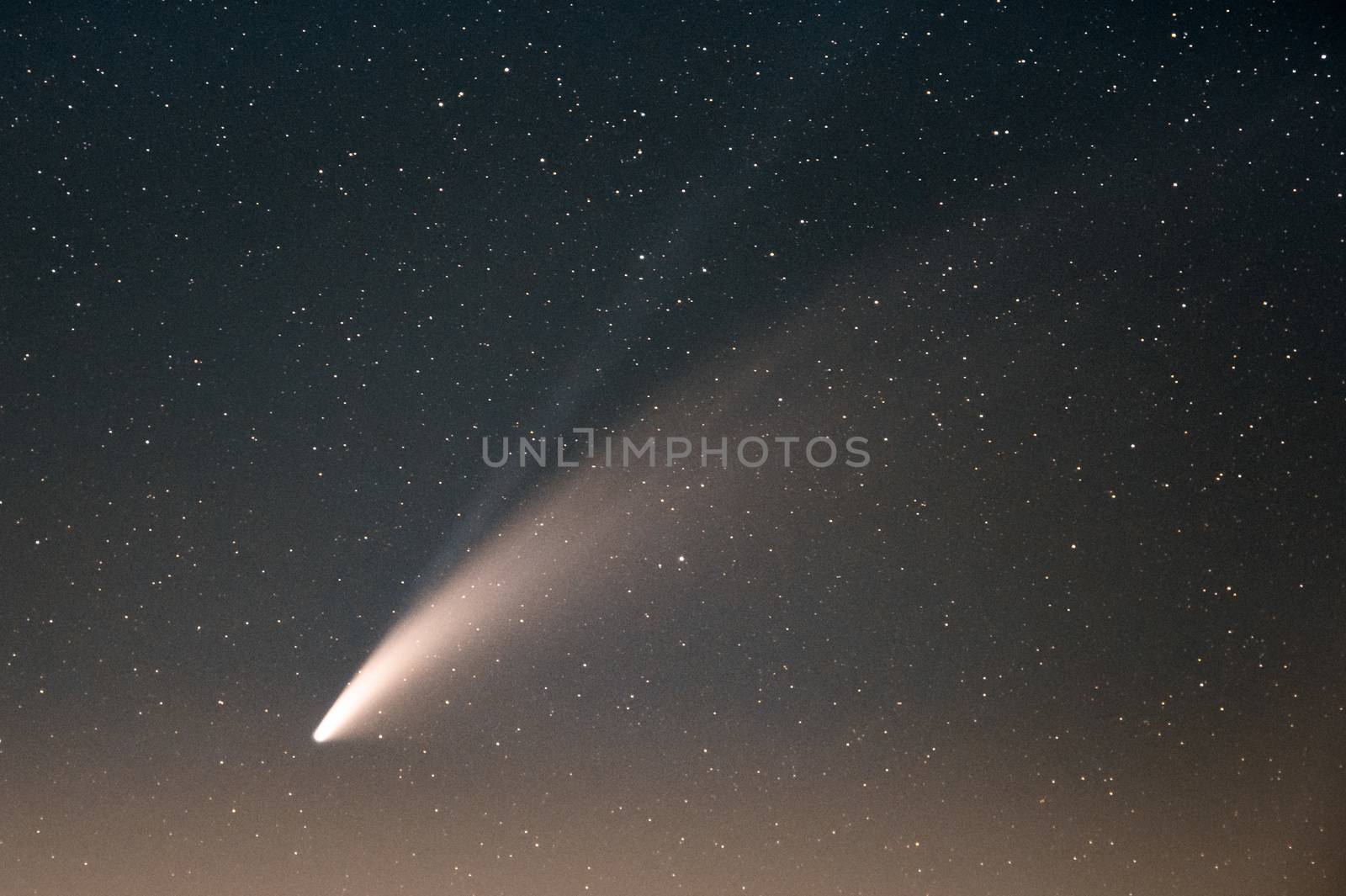 Neowise Comet and its long dust tail after dusk from Etna volcano by mauricallari